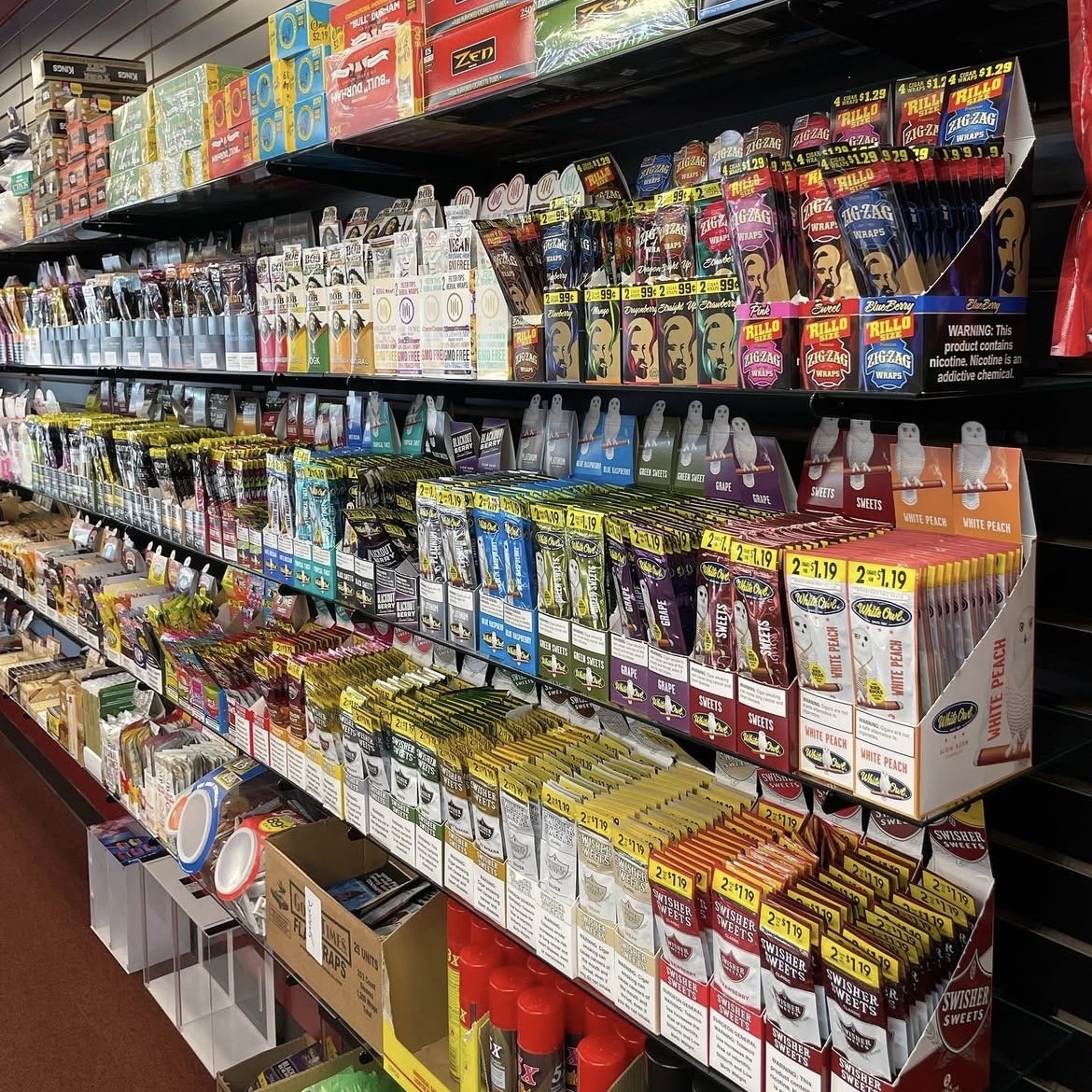 Flavored wraps and smoking accessories on retail wall